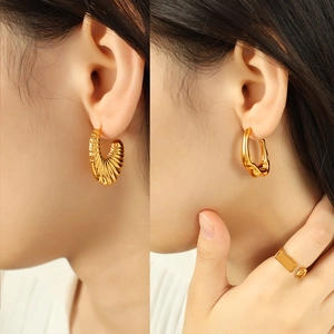 Irregular textured gold earrings and open ring set with vintage fluid metal design