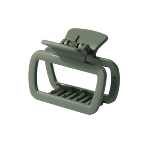 Close-up of matte Morandi green square hair claw clip with hollow design and metal spring