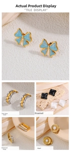 Detailed view of titanium earrings set featuring pearl, zircon inlay, and oil drip designs