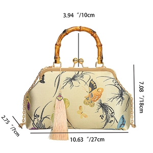 Detailed size chart for beige silk handbag with floral embroidery and bamboo handle