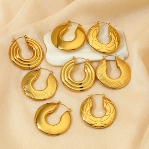 Polished hollow gold-plated stainless steel hoop earrings with four distinct textures