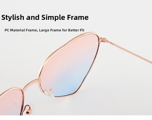 Detail view of heart-shaped sunglasses with PC frame and pink to blue gradient lenses