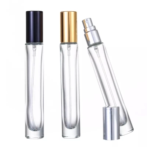 Detailed view of 10ml glass perfume spray bottles with black, gold and silver caps