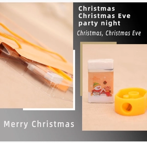 Detailed view of Christmas stationery set with printed eraser and pencil sharpener