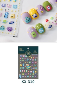 Detailed macro of 3D embossed Monster Planet nail stickers with cute monster and rocket motifs