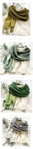 Close-up of fringe details on soft double-sided cashmere scarves in various autumn colors