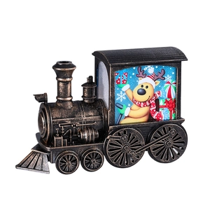 Vintage bronze Christmas train lantern with festive reindeer and snowflake illustration