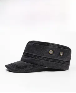 Side view of dark grey washed cotton military cap with metal eyelets and stitched brim