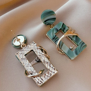 Vintage green acrylic geometric square earrings with gold metal frame on satin