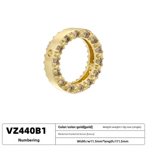 Macro shot of 11.5mm gold plated brass spacer bead with cubic zirconia for DIY bracelets