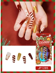 Christmas press-on nails set with reindeer patterns, red stripes, and gold glitter details
