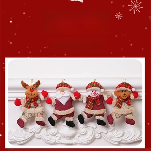 Detail of four Christmas plush ornaments featuring Santa, snowman, reindeer and a bear