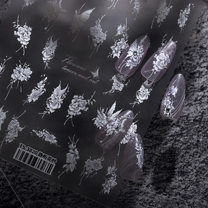 Minimalist silver flower and butterfly nail art stickers with embossed texture for manicure