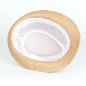 Detail view of the interior 100% paper straw weave and white sweatband on the hat