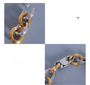 Detail of 18K gold plated surgical steel chain links with textured embossed surface