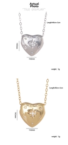 Detail of gold and silver heart pendants with micro-inlaid star-shaped zircons