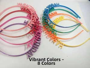 Macro detail of eight colorful Happy Birthday headbands with hollow letter design