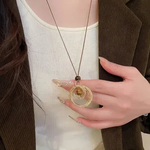 Maillard style tiger eye stone rhombus pendant necklace on brown cord for women