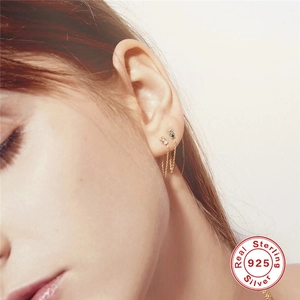 925 sterling silver gold chain earrings with turquoise zircon stone worn by a model
