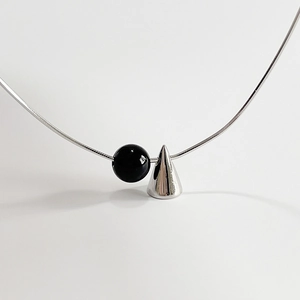 Minimalist 925 sterling silver necklace with black agate bead and silver cone pendant