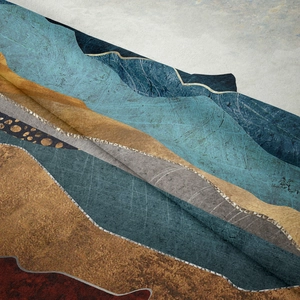 Detailed close-up of mountain landscape tapestry with textured fabric and silver outlines