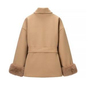 Rear view of camel wool coat featuring faux fur cuffs and a matching waist belt detail