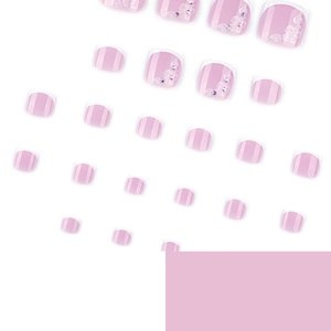 Lilac French tip press-on toenails with white floral patterns and rhinestones