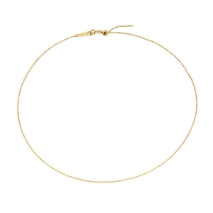 Detail of adjustable gold-plated stainless steel thin cable chain with lobster clasp