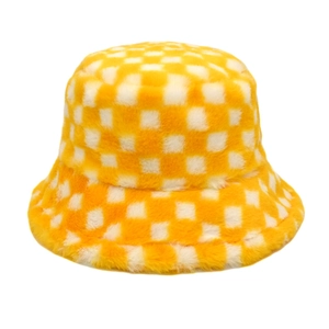 Detailed texture of yellow and white checkerboard plush faux fur bucket hat for winter