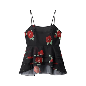 Floral black mesh off-shoulder top with red roses and layered ruffles in a flat lay view
