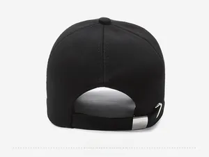 Close-up of black baseball cap back with adjustable strap and silver metal slide buckle