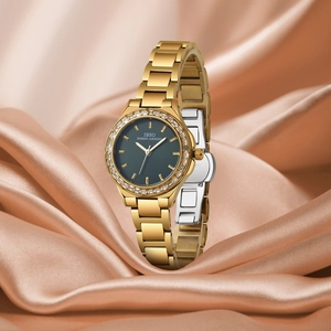 Elegant gold stainless steel women's watch with green dial and gemstone bezel