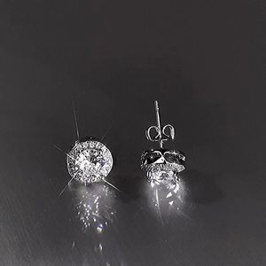 Men's luxury silver halo stud earrings with brilliant round cut cubic zirconia stones