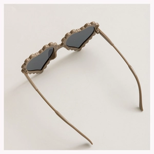 Kids heart shaped sunglasses in khaki plastic frame with dark grey UV protective lenses