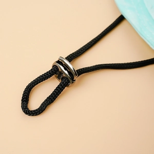 Close-up of adjustable drawstring and silver metal buckle on pet sun protection hat