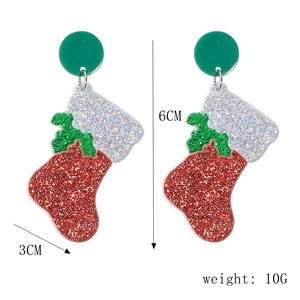Detail view of Christmas stocking earrings with red and green glitter, size 6cm by 3cm