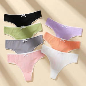 Detail view of multicolored ribbed polyester thongs with bow tie accent for women