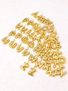 Polished gold alphabet charms from A to Z made of stainless steel for DIY jewelry making