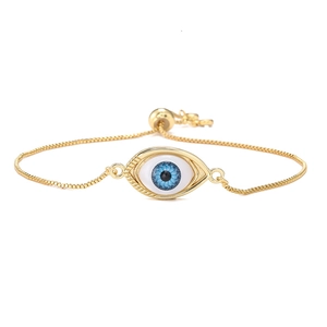 Adjustable golden box chain evil eye bracelet with blue iris and sliding bead clasp