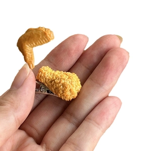 Creative realistic fried chicken leg and wing hair clips for fun food-themed accessories