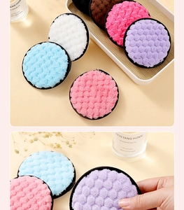 Close-up of soft microfiber cleansing puffs with diamond texture in various colors