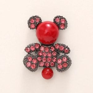 Sparkling red crystal bear shoe charm with rhinestones and pearl accents on beige base