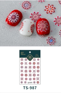 Detail of bohemian mandala nail stickers with 3D embossed texture and floral patterns