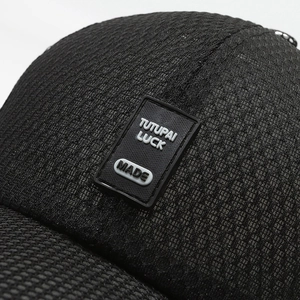 Black summer baseball cap with extended brim and breathable mesh fabric for sun protection