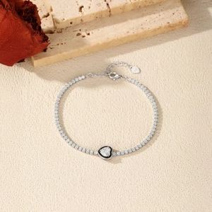 S925 silver tennis bracelet with black enamel heart charm and sparkling zircon stones