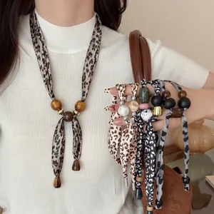 Ethnic style leopard print fabric heart pendant necklace and bag charm for women