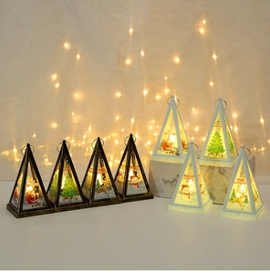 Detail of Christmas lantern with warm LED light and Merry Christmas prints on marble