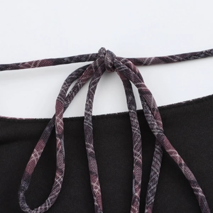 Plaid backless maxi dress featuring black knit fabric and purple mesh tie detailing
