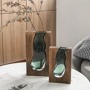 Nordic dark wood and green glass vases set in a luxury minimalist home decor scene