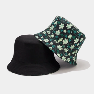 Reversible floral pattern sun hat and plain black bucket hat for outdoor summer wear